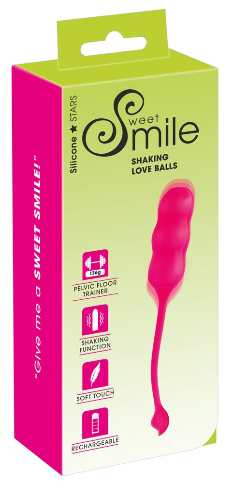 Un doux sourire qui secoue les boules d'amour